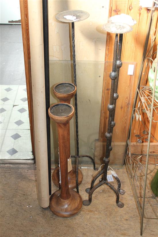 3 iron candlestands and a pair of candlesticks